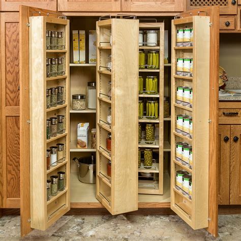 You can buy an actual storage cabinet and put it in the corner or plan it when remodeling. Pantry and Food Storage | Storage Solutions | Custom Wood ...