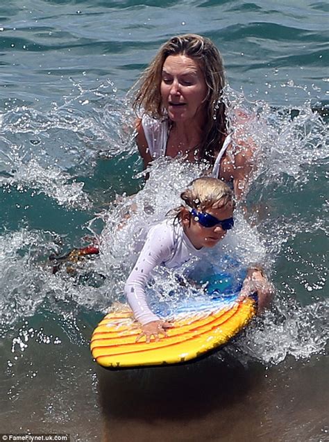 Penny Lancaster Wears A Kaftan While Paddling With Son Aiden Daily