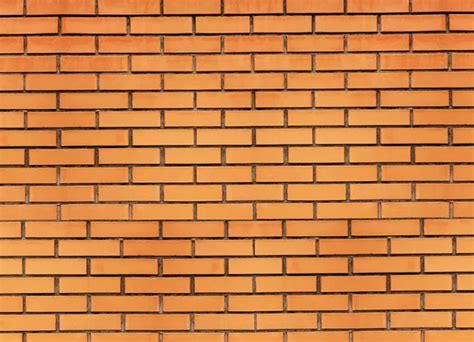 Light Orange Brick Wall Background And Texture Stock Photo By