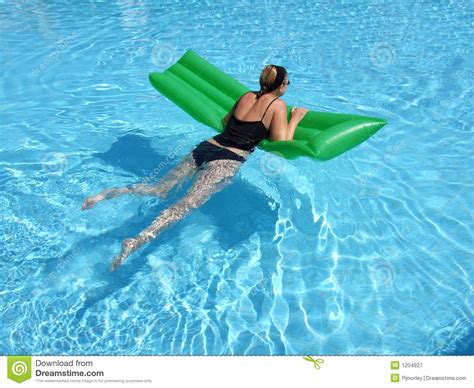Relaxed in the Pool stock image. Image of swimming, recreation - 1204927