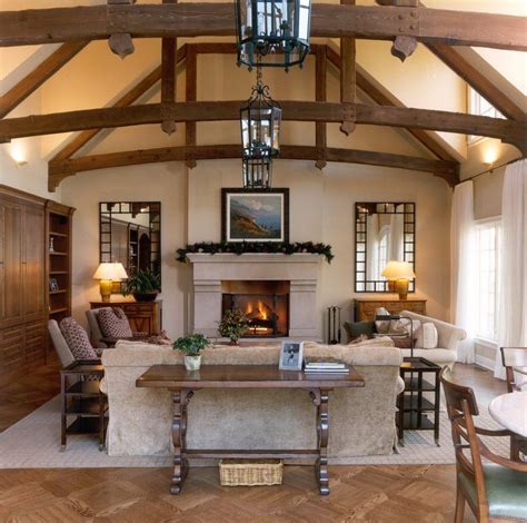 I like the artistic element touch of the elaborate sliding doors. Wood beam ceilings living room traditional with console ...