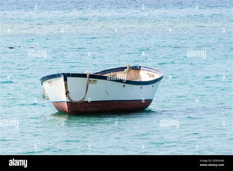 Small Boat Floating In The Middle Of The Sea Canary Islands Spain