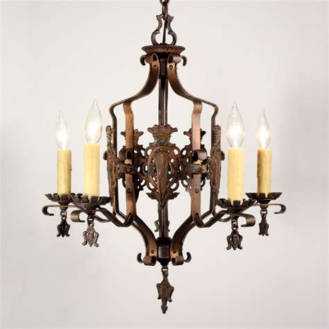 Measuring 49'' h x 44'' w x 44'' d, it brings all the panache of a traditional chandelier. Handsome Antique Iron Spanish Revival Five-Light ...