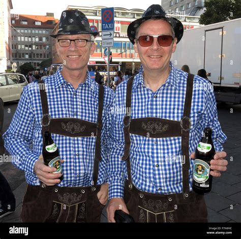 Oktoberfest In Munichbaveriagermany Two Tourists In Lederhosen Stock