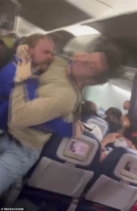 Unseemly Moment Two Men Brawl On Flight After Loud Drunken Passenger And