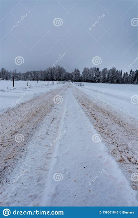 Snowy Fields With Road And Fence In Sweden Stock Image Image Of Dark