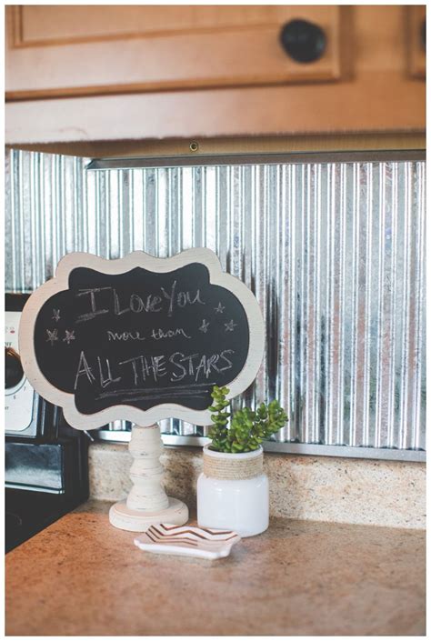 Metal buildings metal awning corrugated metal home house exterior farmhouse windows diy awning farmhouse window treatments metal how to use corrugated tin as a backsplash in a kitchen. corrugated metal backsplash | Metal backsplash kitchen ...