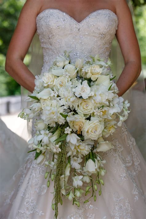 Cascade Bouquet With White Orchids White Peonies Cream Roses White Stephanoti Bridal