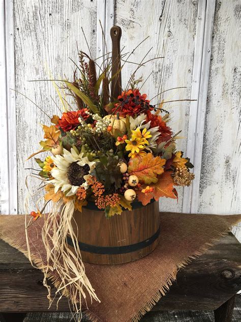 Place flowers in a holding treatment such as floralife® express 200. Vintage Wood Bucket fall floral arrangement from my #etsy ...