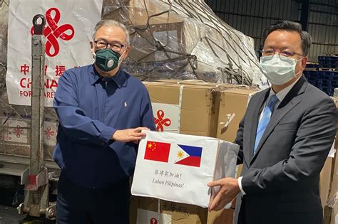 Thousands Of Test Kits Masks From China Arrive In Ph To Aid Covid 19