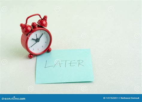Procrastination Postpone Or Laziness Concept Red Alarm Clock On