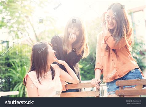 Three Beautiful Happy Asian Girl Smile And Laugh Togetherimage With Sunlight Filter Stock