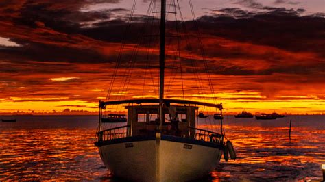 Download Wallpaper 1920x1080 Boat Sunset Sky Full Hd