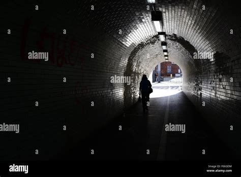 A Woman Walking Alone Through A Tunnel On Leeman Road York North