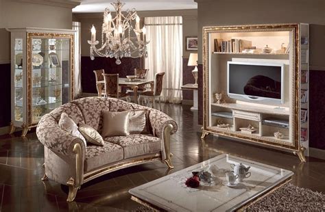 Rich wood and heavy beams are an excellent and classy way to bring nature inside. Luxury tv stand lacquered pearl white, gold decorations ...