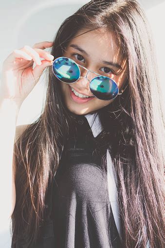 Portrait Of Thai Teen Glasses Beautiful Girl Relax And Smile Stock