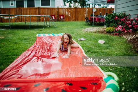 Slip N Slide Backyard Photos And Premium High Res Pictures Getty Images