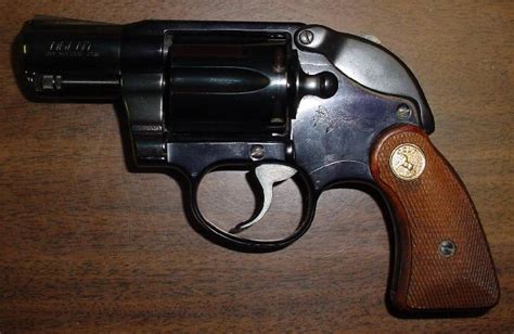 Colt Agent 38 Caliber Revolver Walnut Grips Look