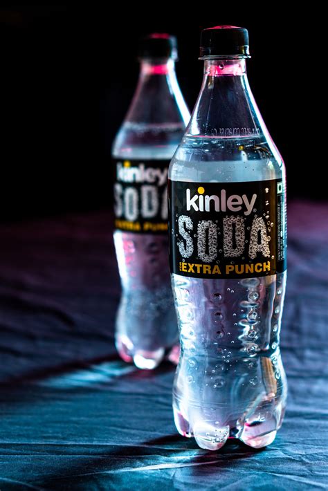 Soda Bottle On A Shiny Surface Focused On Foreground Pixahive