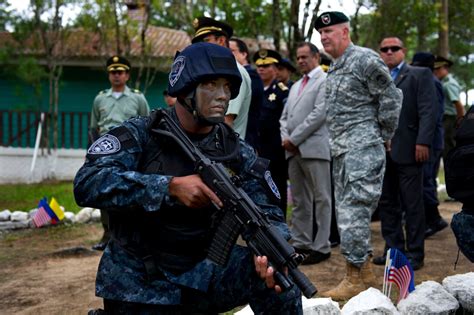 A Honduran Commando Conducts Security For Us Army Brig Gen Sean P