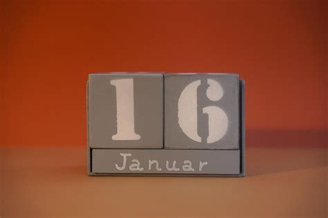 Premium Photo 16 Januar On Wooden Grey Cubes Calendar Cube Date 16