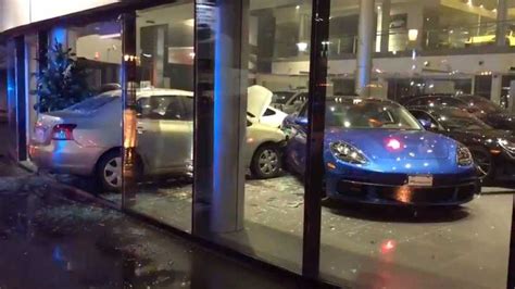 Man Having Bad Day Deliberately Crashes Into Porsche Dealer