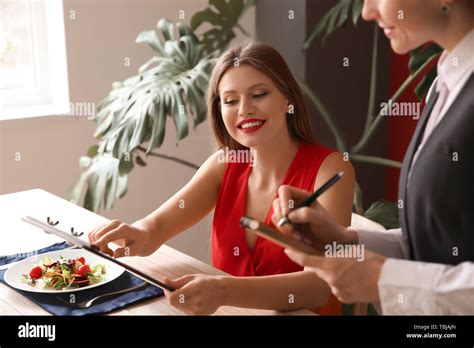 Waiter Taking Order In Restaurant Stock Photo Alamy