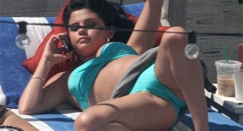 Selena Gomez Spreads Her Legs In A Bikini