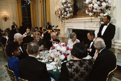 guests seated with president bush and queen elizabeth at a state dinner white house historical