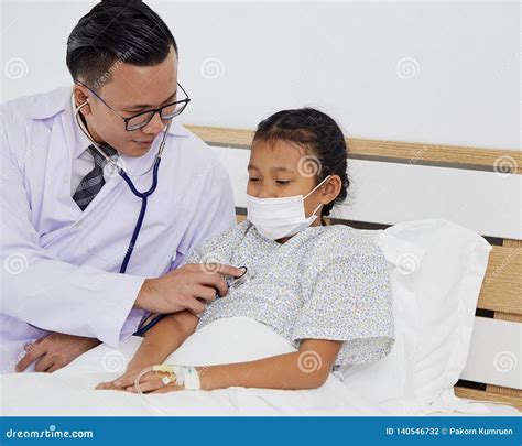 The Doctor Is Treating The Girl Stock Photo Image Of Check Female