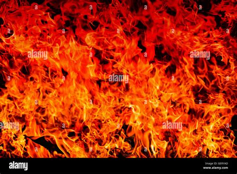 Abstract Blaze Fire Flame Texture On Gradient Shade For Background Use