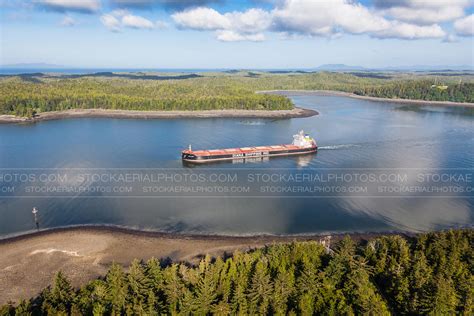 Aerial Photo Cargo Ship Departing The Port Of Prince Rupert