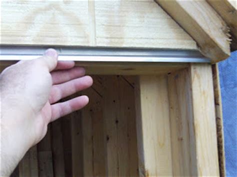 Two safety features are installed in the garage door opener that prevents the door from closing and makes the lights to flash. Sonoma Shanty: Getting ready for door installation