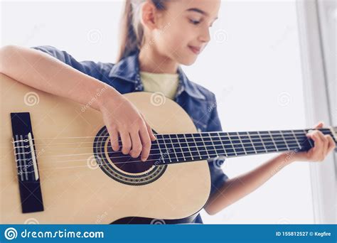 Girl Learning To Play Guitar Stock Image Image Of Note Instrument