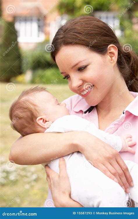 Close Up Of Mother Cuddling Newborn Baby Boy Outdo Stock Image Image