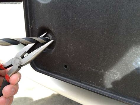 And then you may want to find some button plugs or whatever. How To Remove the Front License Plate Bracket / Holder ...