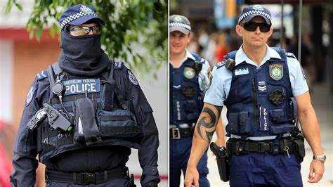 Afp Police Officers Forced To Hide Tattoos Under New Uniform Rules