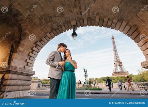 A Romantic Couple Of Lovers Meet Near The Eiffel Towerparis France