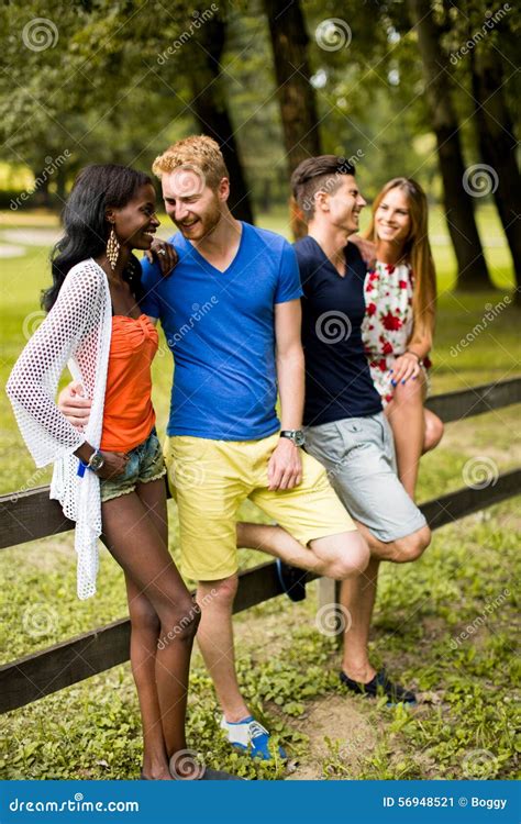 Young Multiracial Friends In The Park Stock Image Image Of Ethnic
