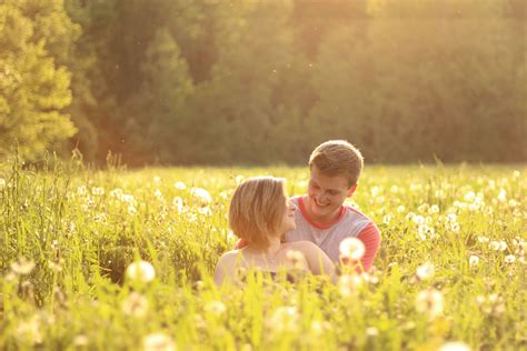 Beautiful Couple Photo In A Flower Field Summer Engagement Photos