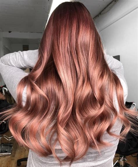 The safest and most unique way to blend this with your natural color, is to apply it only in the middle shaft to the tips of the hair, while leaving the roots naturally darkened. Dazzling Rose Gold Hair Colour Ideas