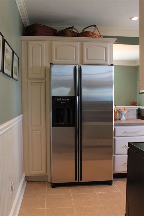 What does kitchen cabinet mean. The cabinet beside the refrigerator is a GREAT pantry pull out that fits everything but the ...