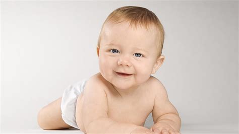 Grey Eyes Cute Baby Is Lying Down On Floor In White Background Cute Hd