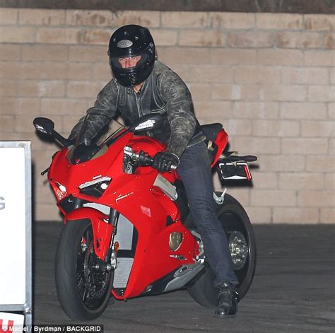 Tom Cruise 56 Models Top Gun Style Leather Jacket As He Hops On His