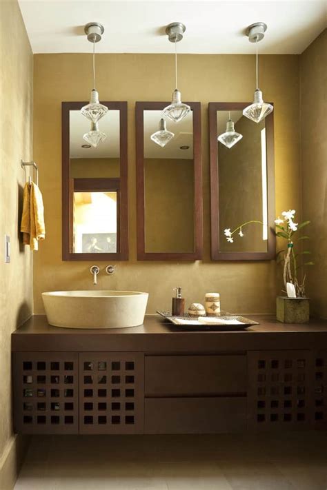 Rather than sticking with a basic vanity mirror, consider switching it up. WOW! 9 Best Bathroom Mirror Ideas to Enhance your Bathroom
