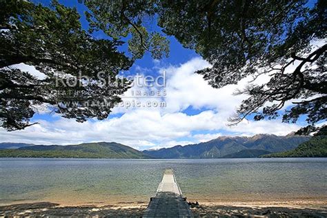 Boat Jetty On The Shore Of Lake Hauroko New Zealands Deepest Lake At