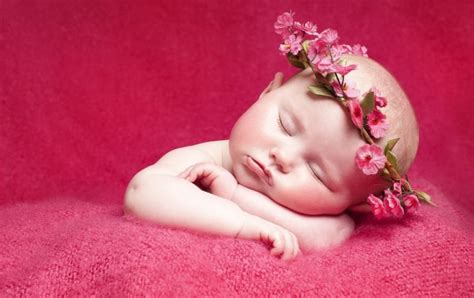 Newborn Little Girl And Flowers Wallpapers