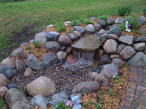 I really don't want to spend $400 and up on a kit for something so small. Pondless waterfall | Waterfalls backyard, Backyard water ...