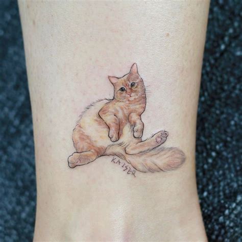 Cat Tattoo On The Ankle