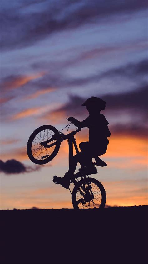 download bmx biker showing off his latest trick wallpaper